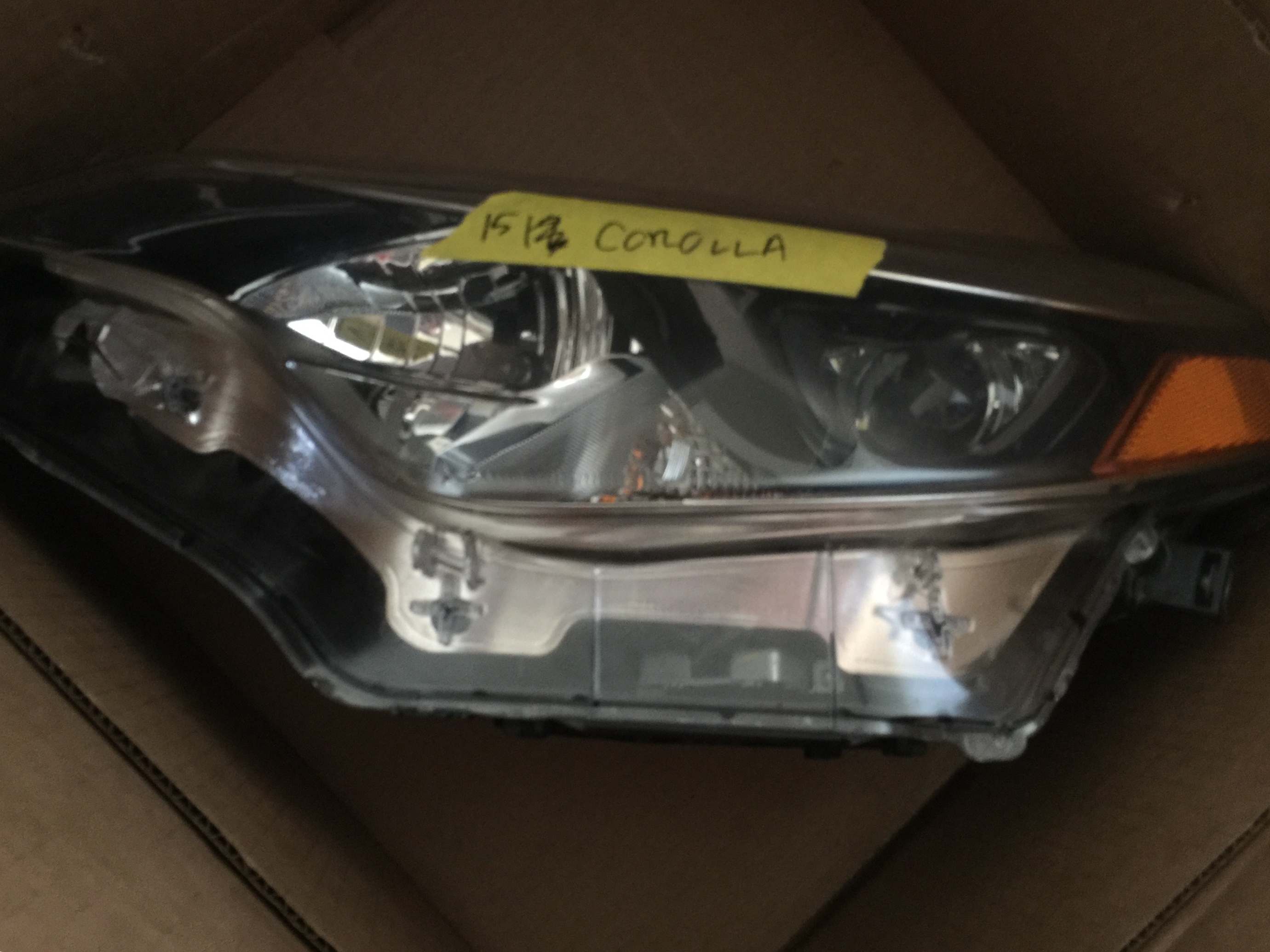 image of 2015 Toyota Corolla Headlight Driver Side